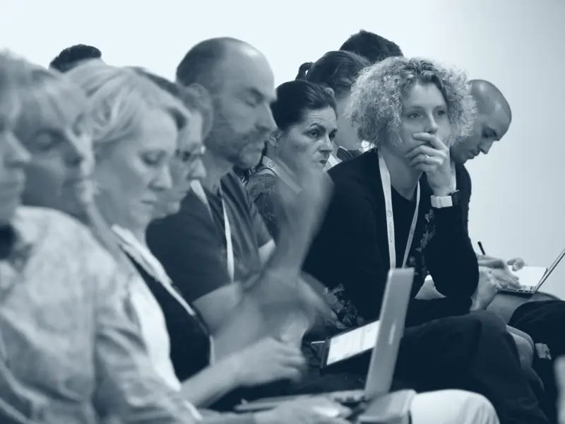 A row of delegates watching a session at a Physio Matters live event